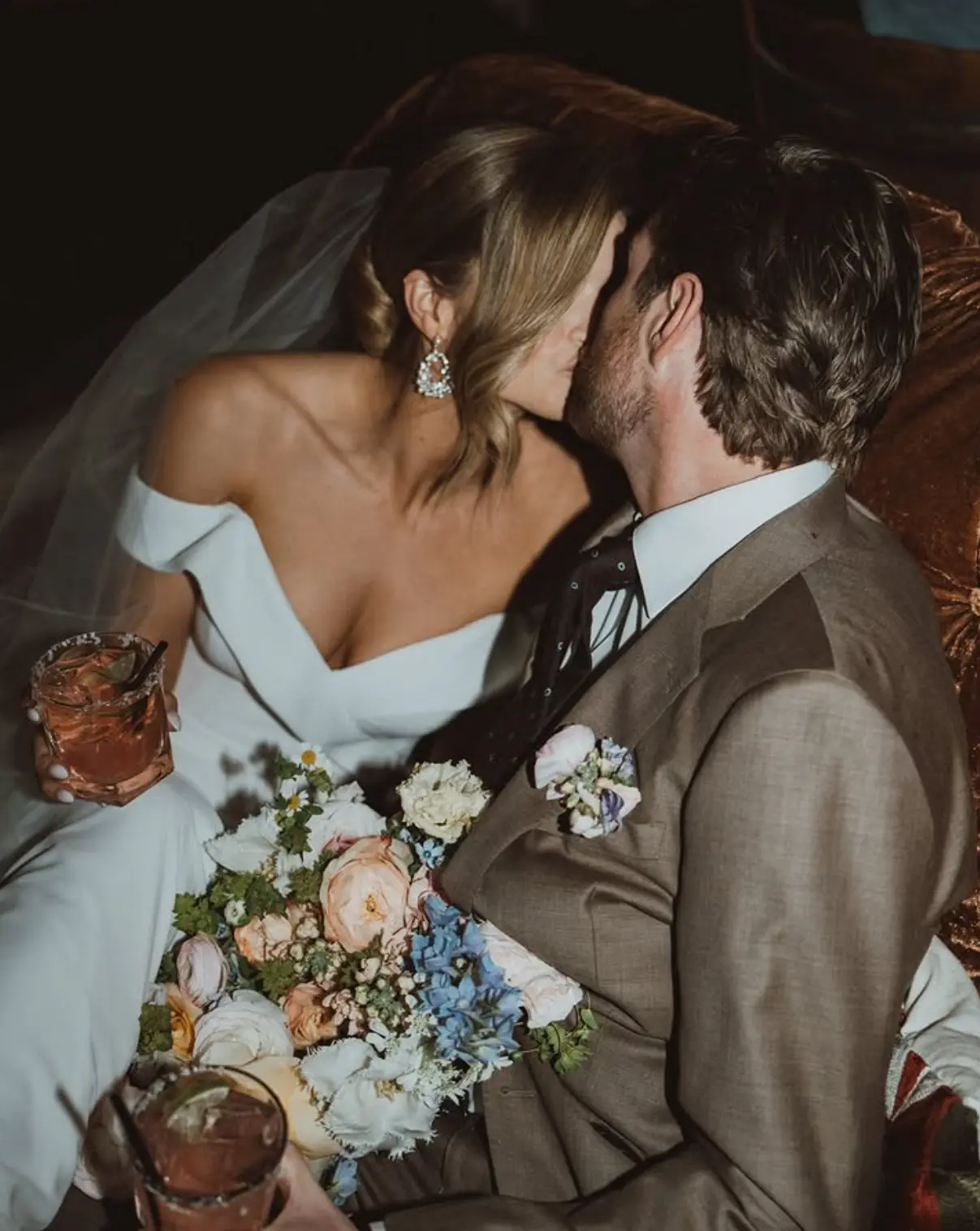 A bride at her wedding reception, photographed for an independent bridal boutique